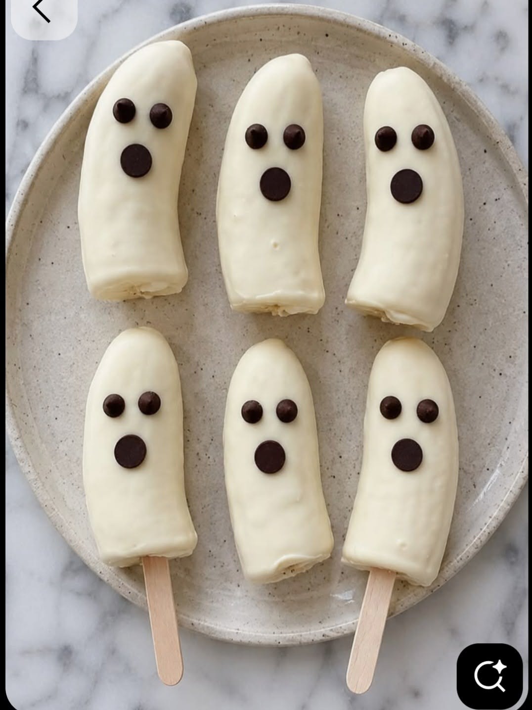 Four Marshmallows with Chocolate Eyes on Them